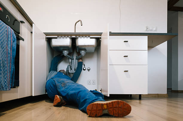 Professional Drain Cleaning technician working in Auburn, NY